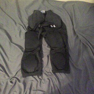 Black under Armor football pants